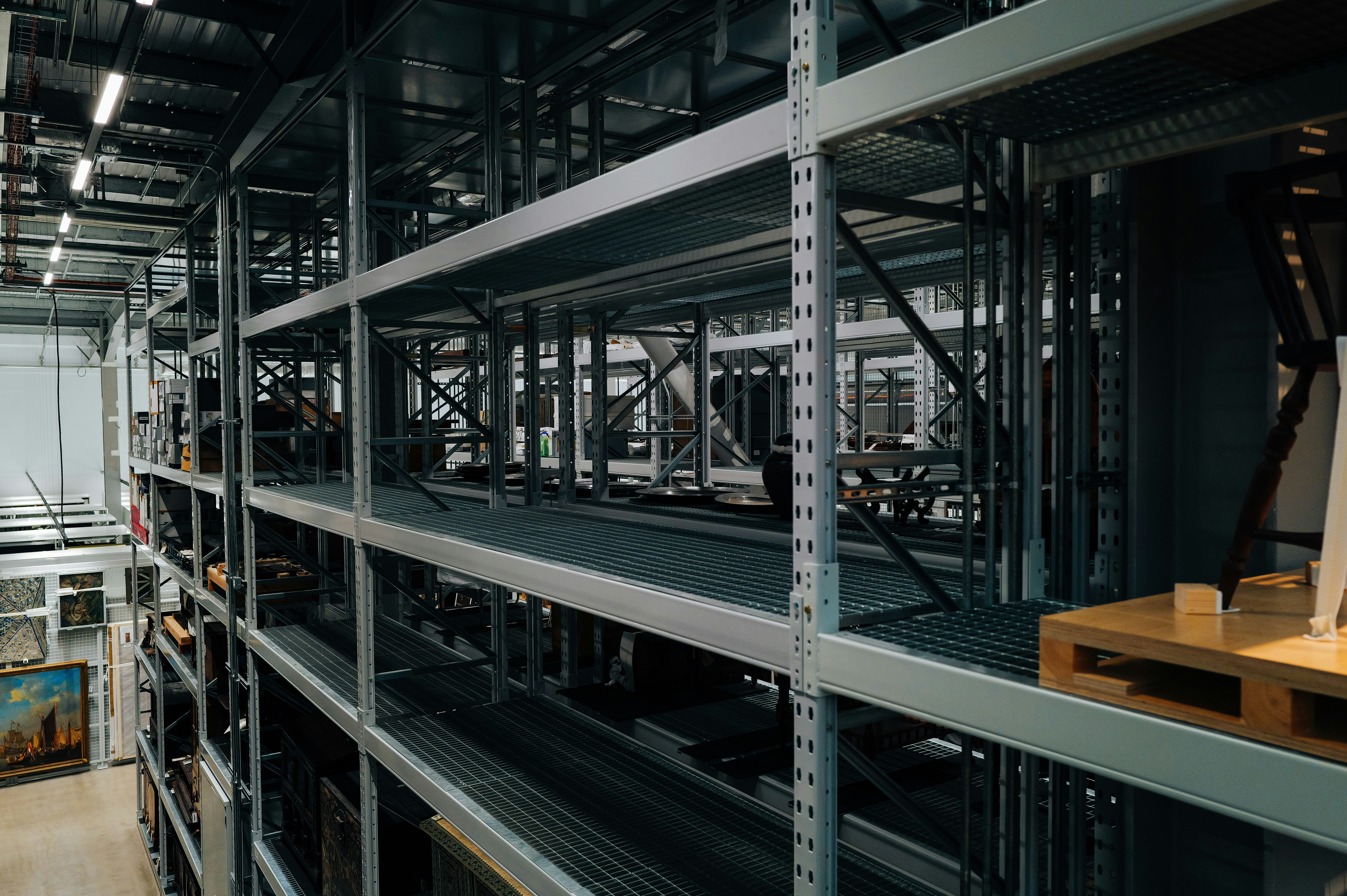 Industrial shelving holding boxed products in a China consolidation warehouse